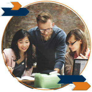 Three colleagues working on a project together.